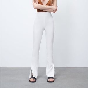 Flared pants with side slits